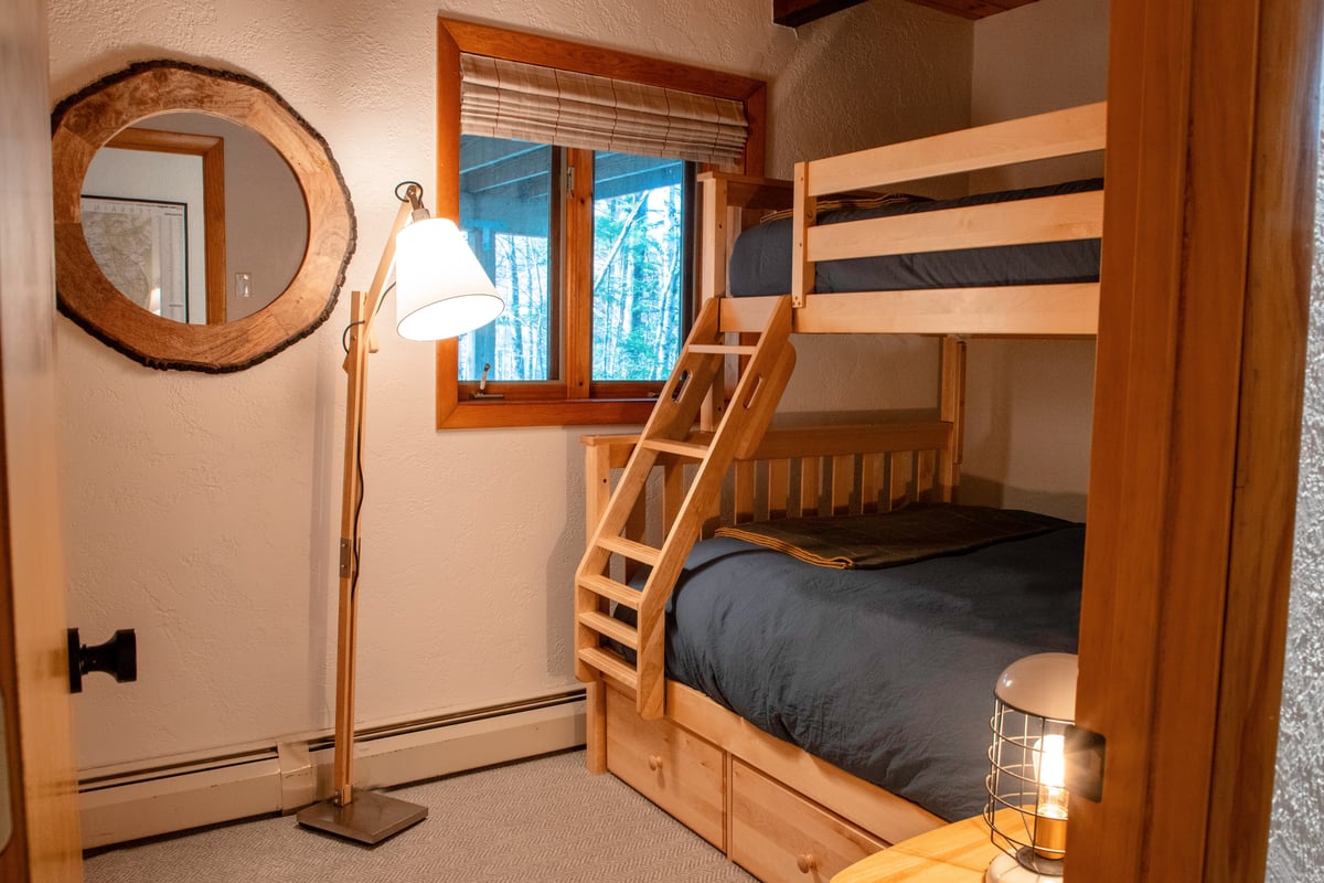 Bunk room with full bed on bottom, twin bed on top